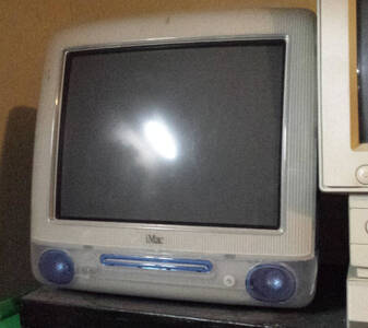 Translucent white and blue computer with built-in CRT monitor
