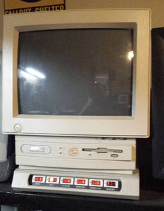 Beige computer with built-in CRT monitor